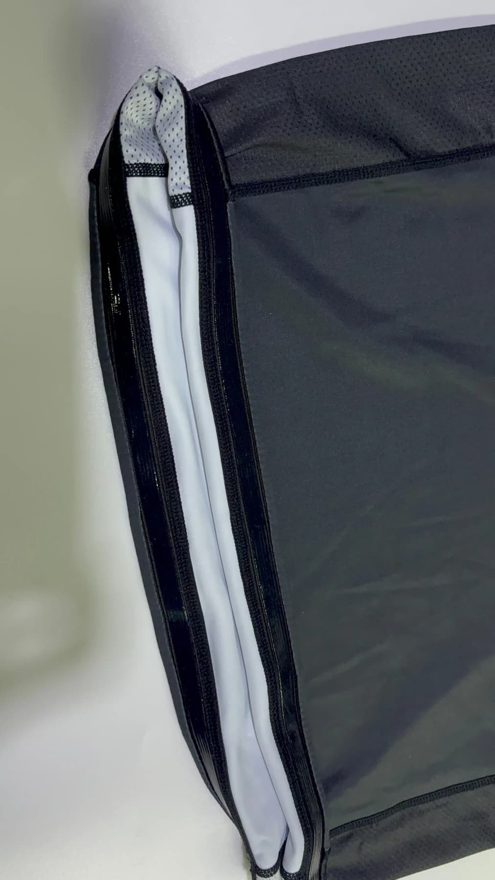 Inside view of the rash guard hem and anti-slip elastic construction