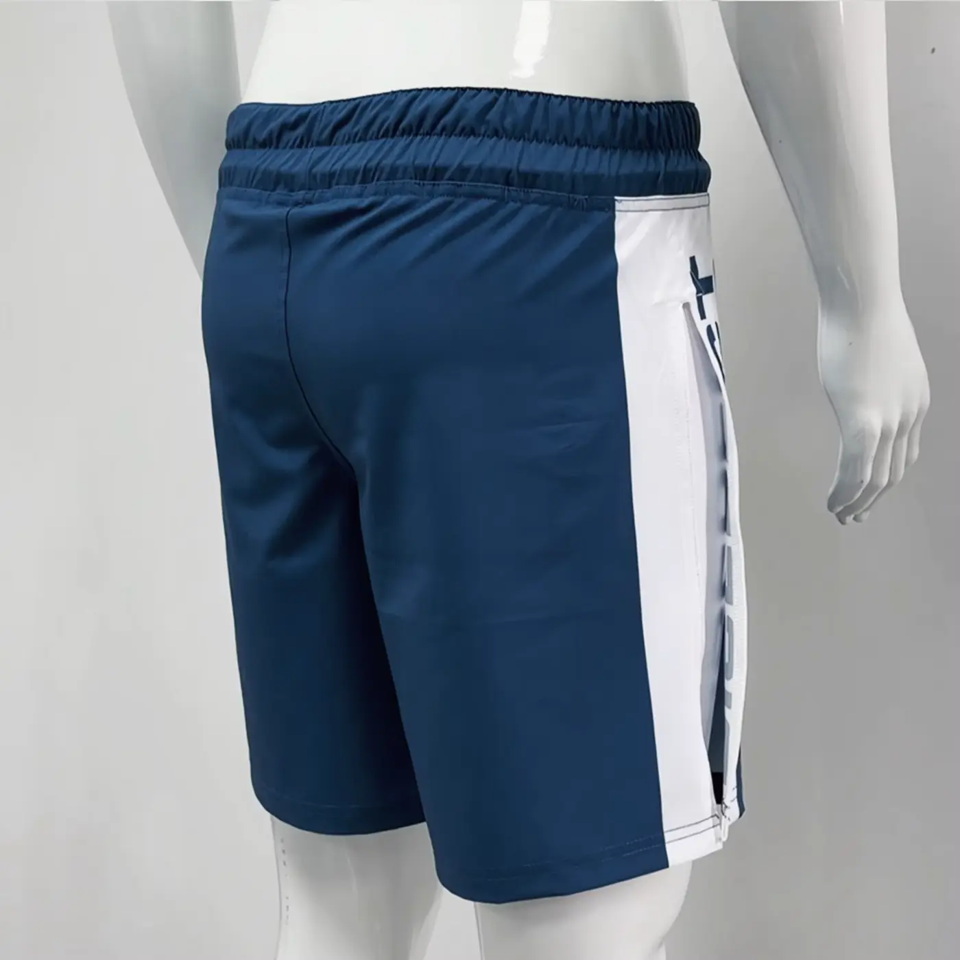 Rear view of blue and white two-in-one grappling shorts sample