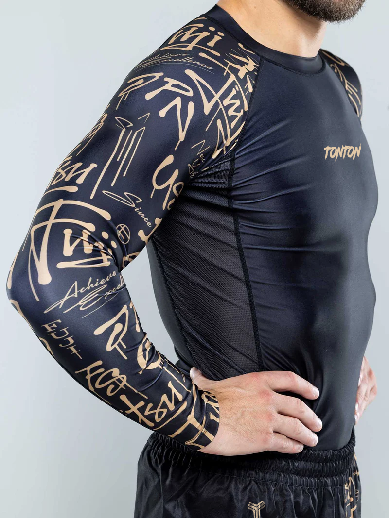 Black gold long sleeve rash guard