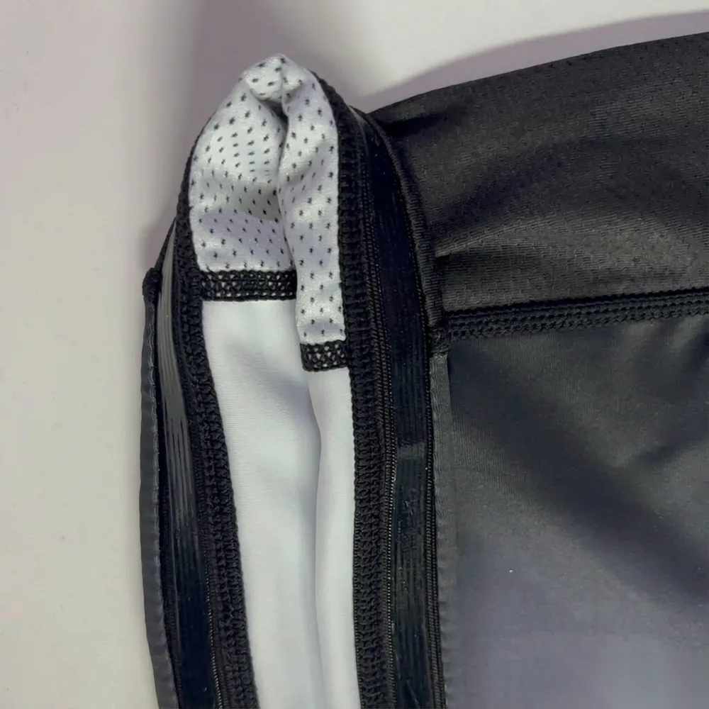 Inside Rash Guard hem with silicone anti-slip grip, mesh panel and finished stitching