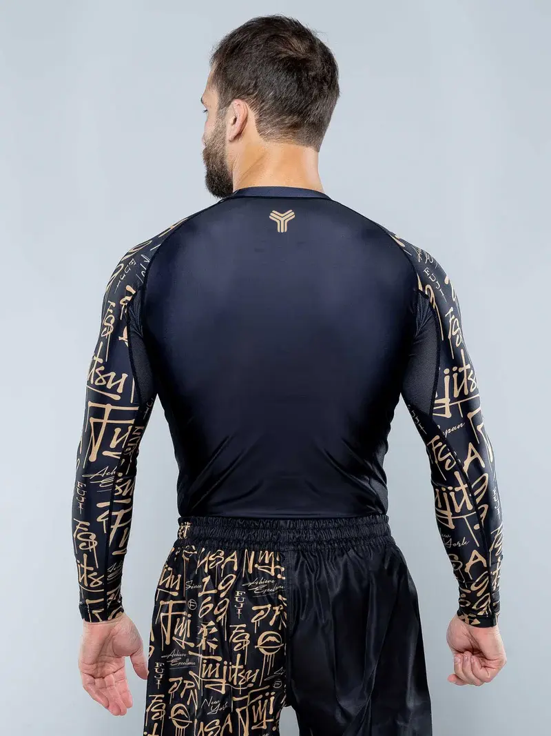 Back view of a black and gold long-sleeve Samurai Rash Guard