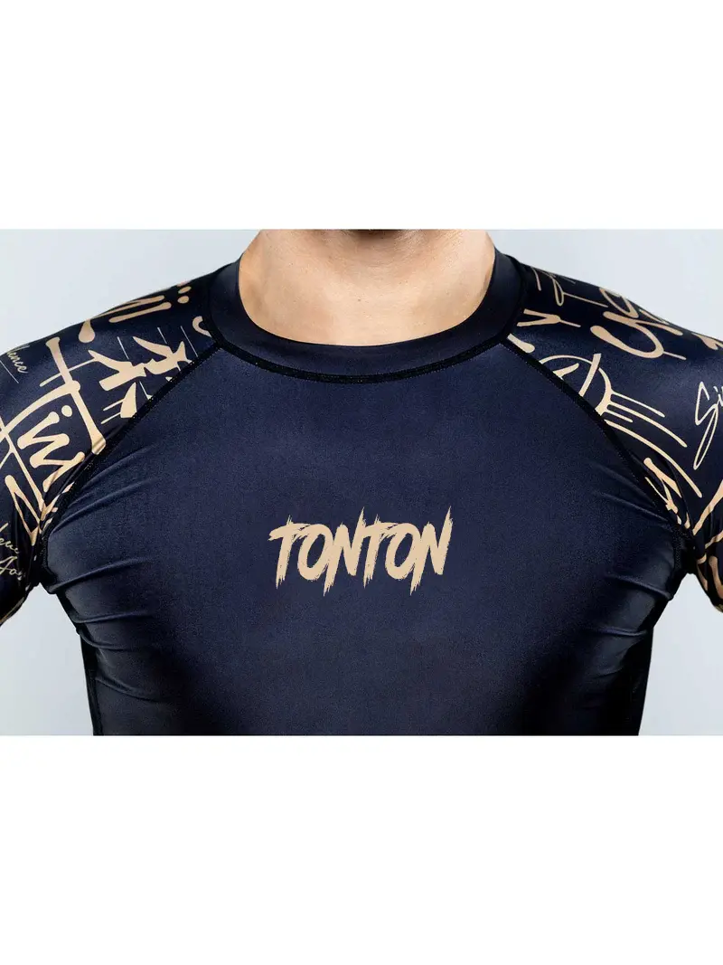 Round neckline and TONTON chest logo on a Samurai Rash Guard