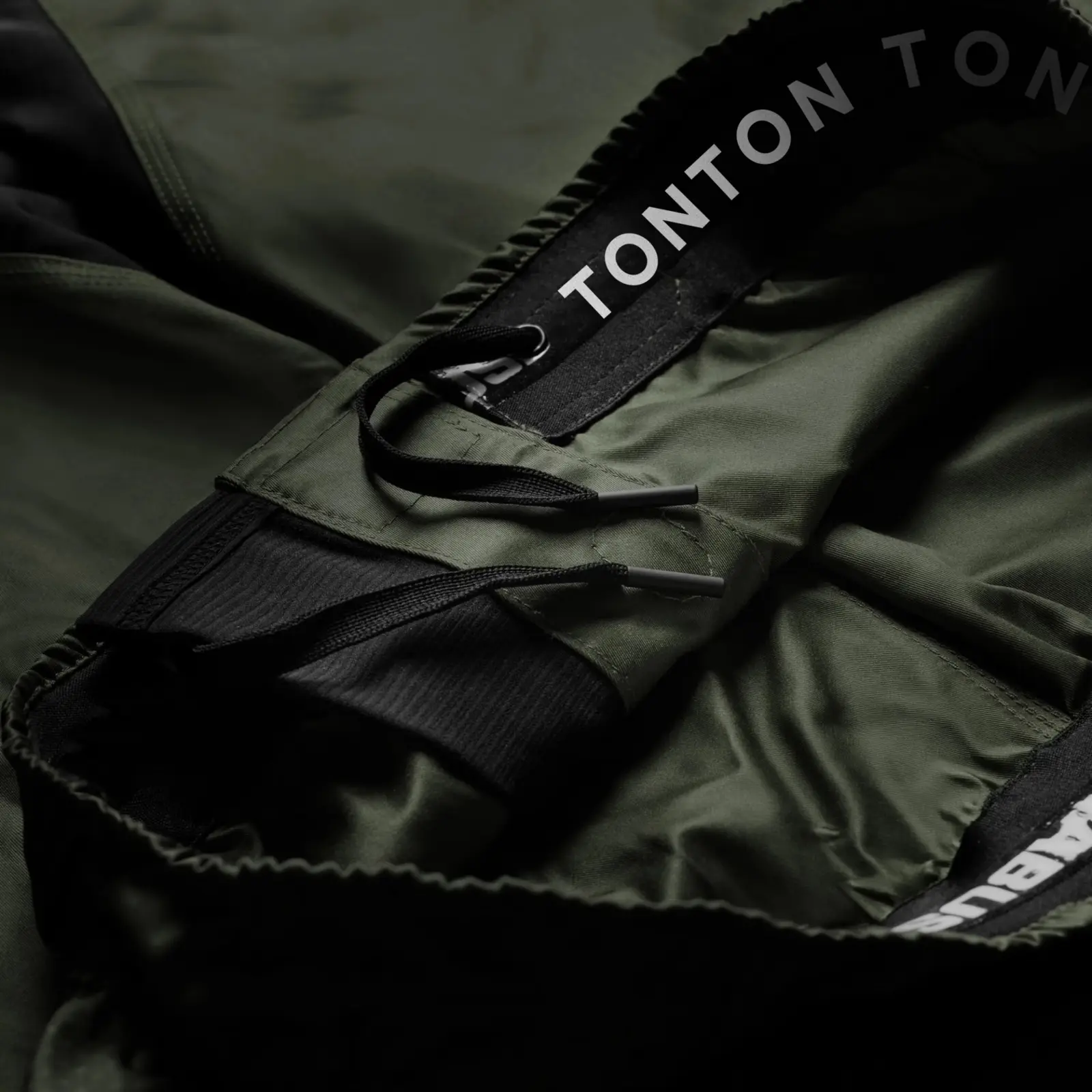 Interior drawcord and waistband branding on training shorts