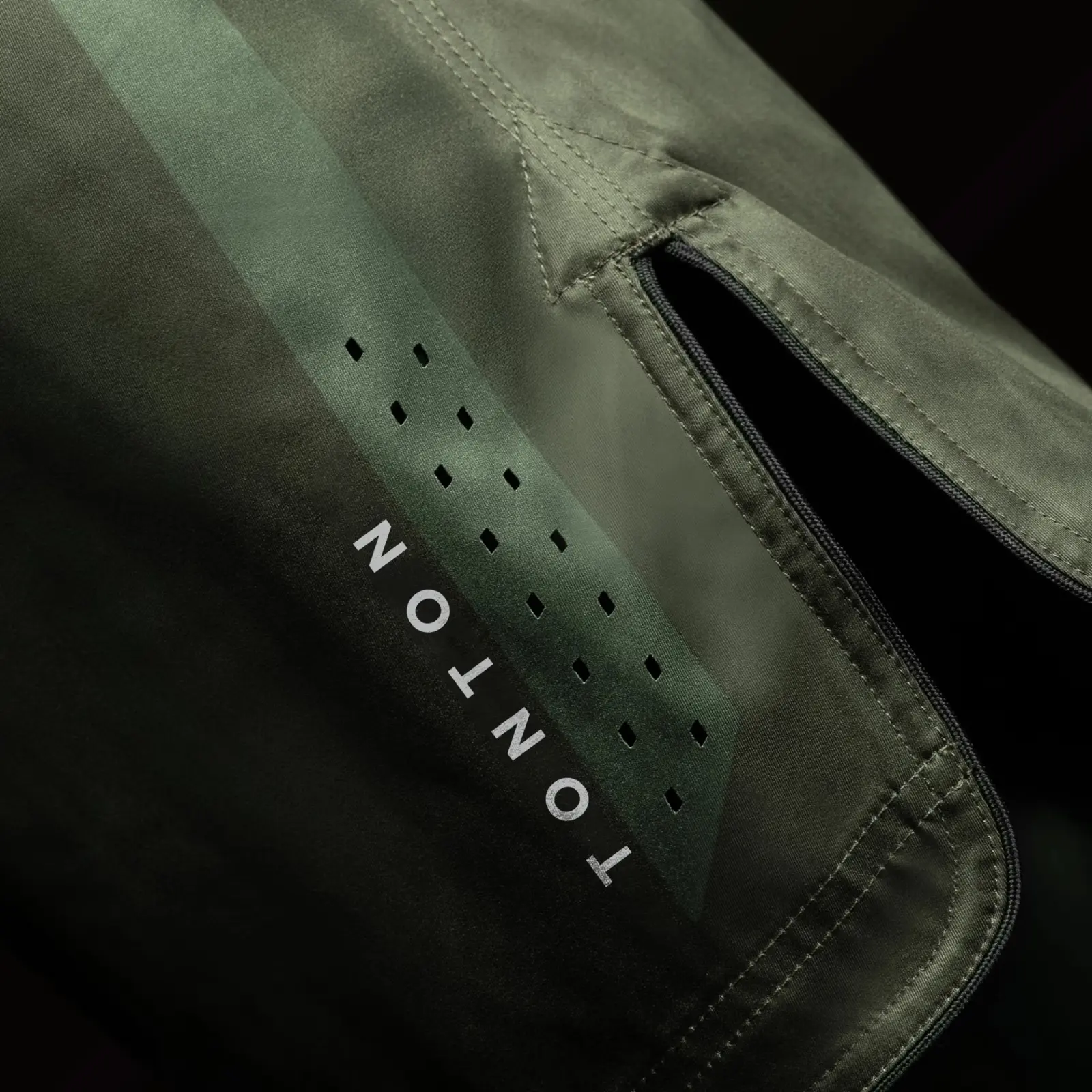 Training shorts side ventilation and zip pocket detail